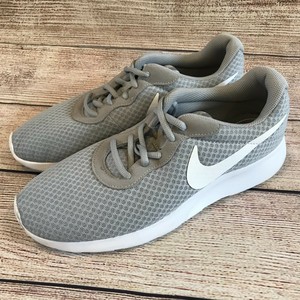 nike tanjun size 10