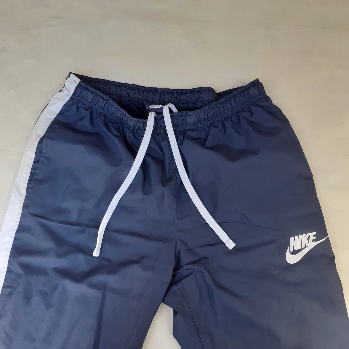 Nike Track pants Men s Small Blue White Stripe Leg Soft shell