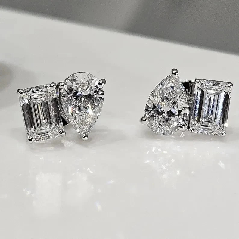 4TCW Emerald & Pear Cut Toi et Moi Moissanite Stud Earring 14K White Gold Plated