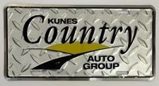 2010 KUNES COUNTRY AUTO GROUP BOOSTER License Plate
