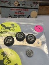 VINTAGE SLOT CAR TIRES AND RIMS USED