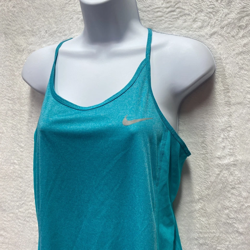 Camiseta sin mangas Nike Dri-Fit para mujer azul medio Swoosh cuello redondo ropa deportiva espalda deportiva Foto 2 de 4