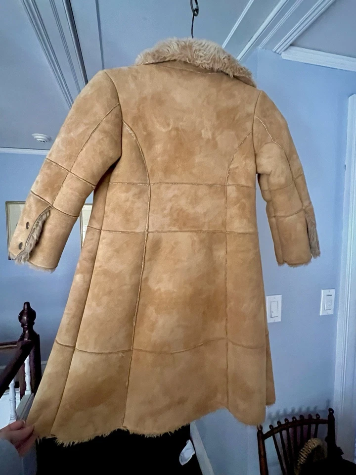 Abrigo Marks and Spencer de piel de oveja sintética para niños Foto 4 de 4