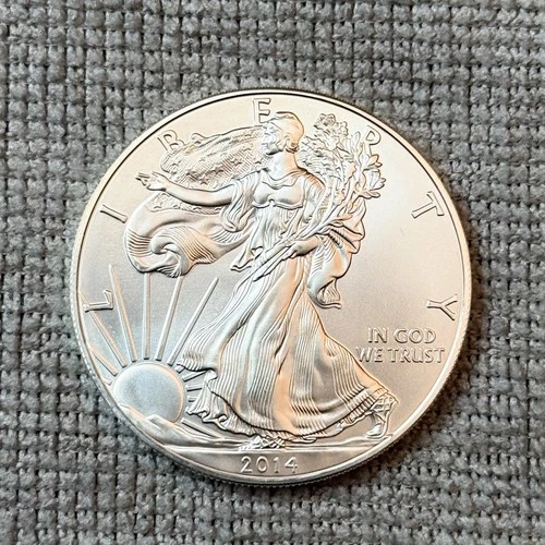 2014 American Silver Eagle 1 oz .999 Fine Silver $1 BU – In Plastic Sleeve