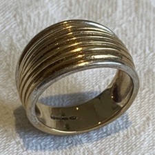 1990’s 9ct Yellow Gold, white gold edging 12mm wide ribbed band ring. Hallmarked
