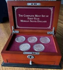 The Complete Mint Set of First Year Morgan Silver Dollars all 5 mints w/ booklet