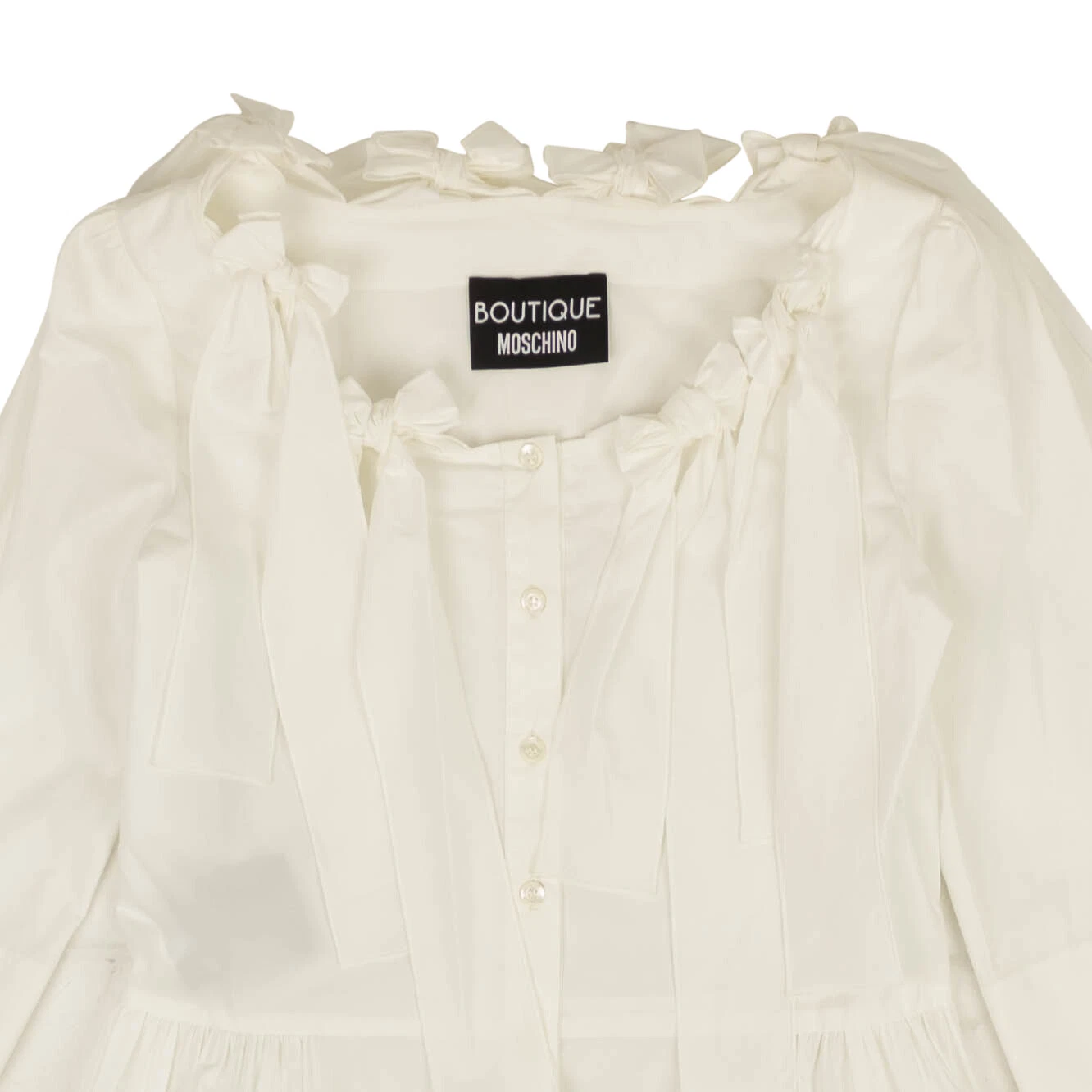 Mini abito nuovo con etichette BOUTIQUE MOSCHINO bianco fiocco accentuato aderente e svasato taglia 10 46 $670