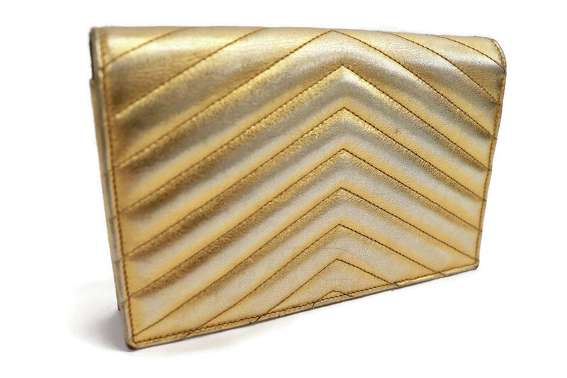 SAINT LAURENT Borsa a tracolla portafoglio in oro monogramma Metalasse