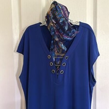 Calvin Klein women’s size large dress with button and chain. Scarf included.
