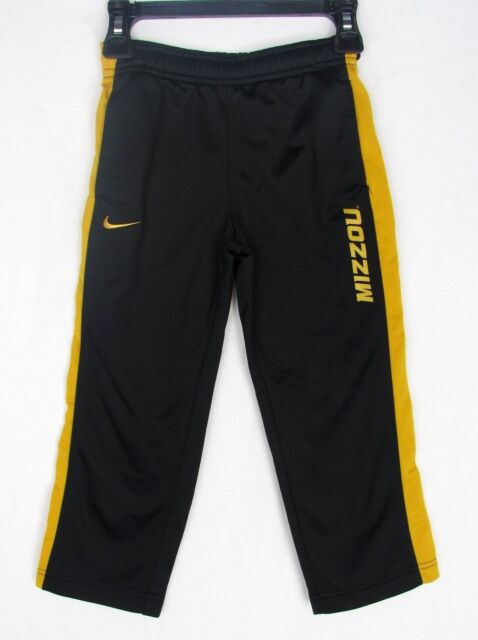 black and yellow nike pants