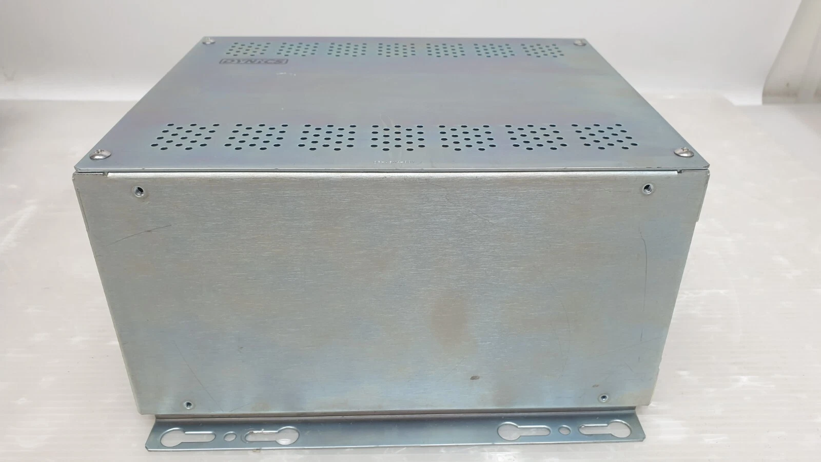Dynics industrial computer case, front view with mounting bracket