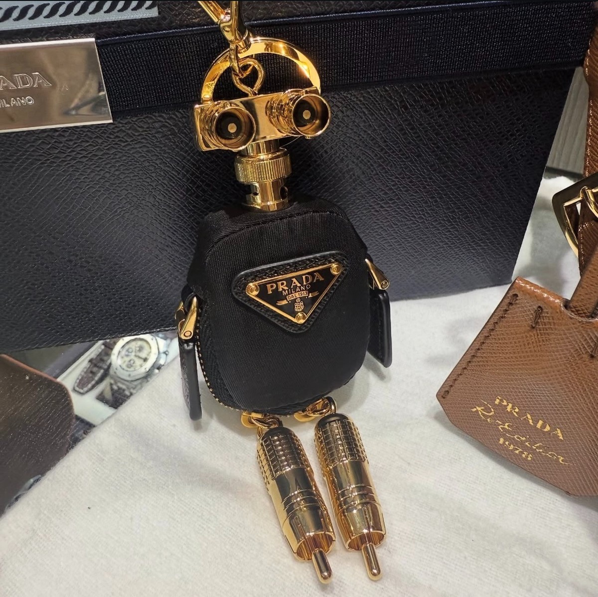 Prada Re-Edition 1978 Small Re-Nylon backpack & Robot Bag Charm 