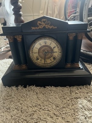 Outstanding antique Ansonia cast iron chiming mantle clock in full working order