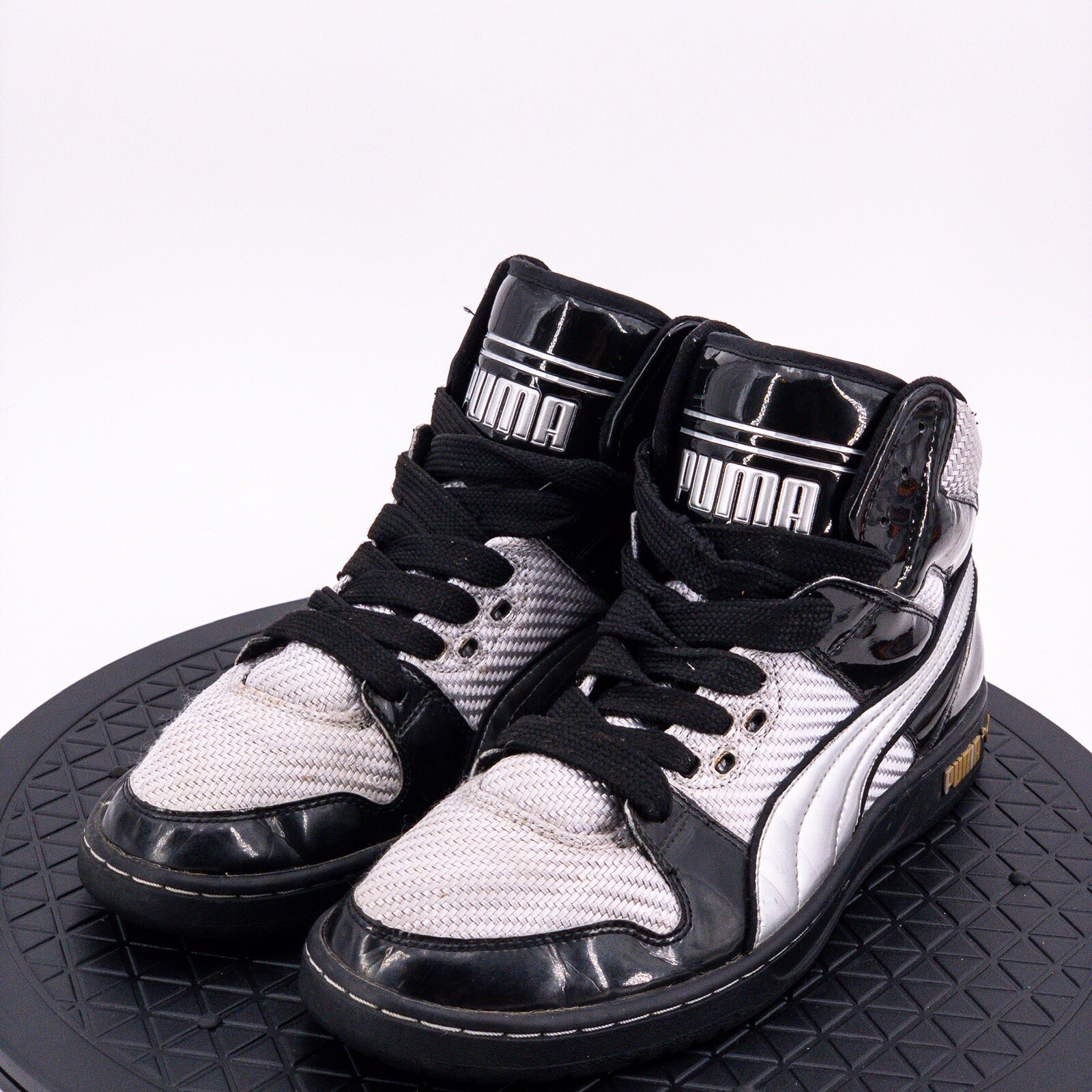 black leather pumas men's