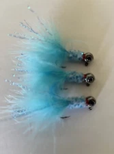 Three hand tied 1/16 crappie jigs