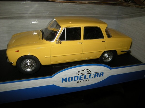 1:18 Modelcar Group Alfa Romeo Giulia Nuova Super Yellow/Gelb 1974 In Ovp-image