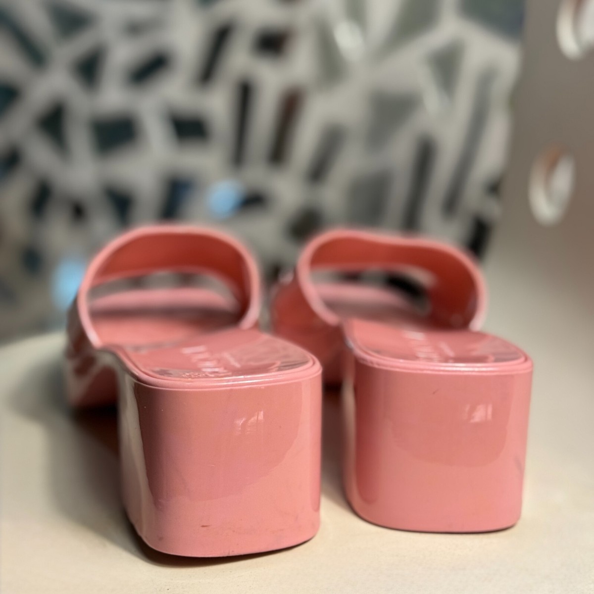 Gucci pink rubber embossed logo block heel slide sandals for
