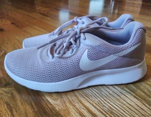 nike tanjun particle rose