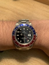 Rolex GMT-Master II 16700 Silver Oyster Bracelet with Blue and Red Bezel