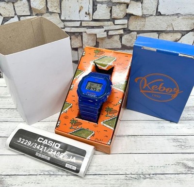 Casio G-SHOCK DW-5600KEBOZ22 Digitaluhr Klar Blau Silber Akzente