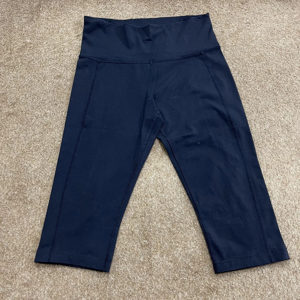 Legging capri femme Lululemon logo marine taille S poches extensibles - Photo 1/4