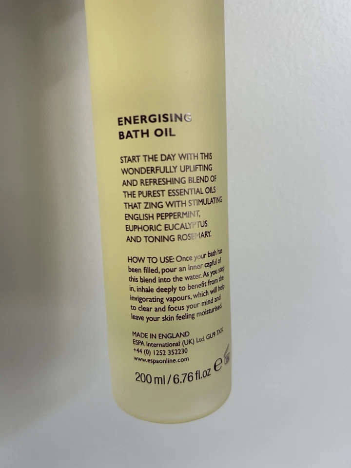 Aceite de baño energizante ESPA energizante botella moderna de vidrio alto de 6,7 fl oz Foto 2 de 2
