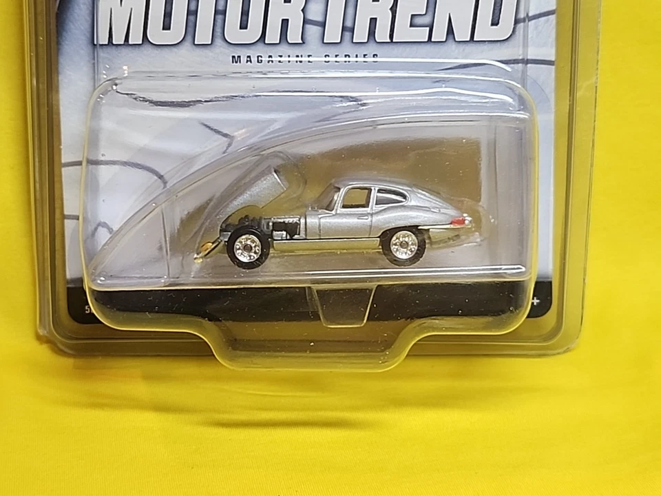 100% HOT WHEELS MOTOR TREND JAGUAR XKE 4/4 PILOTOS REALES Plateado con Protector 🔥A9 Foto 3 de 4