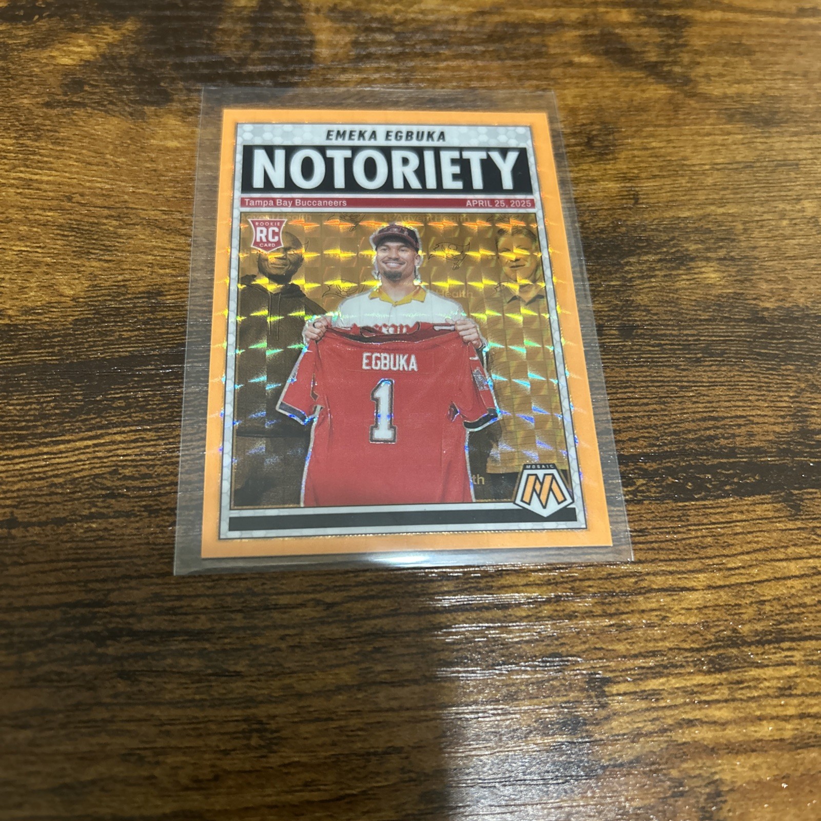 2025 Panini Mosaic - Notoriety Emeka Egbuka #16 Orange Mosaic Prizm (RC)