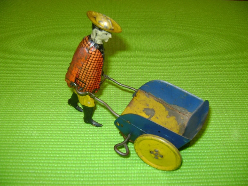 JOUET MECANIQUE ANCIEN JARDINIER AVEC BROUETTE  EN TOLE-GERMANY-EPOQUE LEHMANN - Photo 2/4