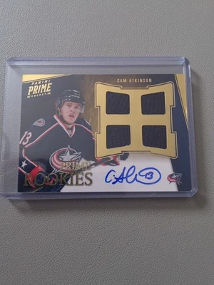 2012 PANINI#114 CAM ATKINSON PRIME ROOKIE AUTO QUAD JERSEY 109/199 - Image 1 of 2