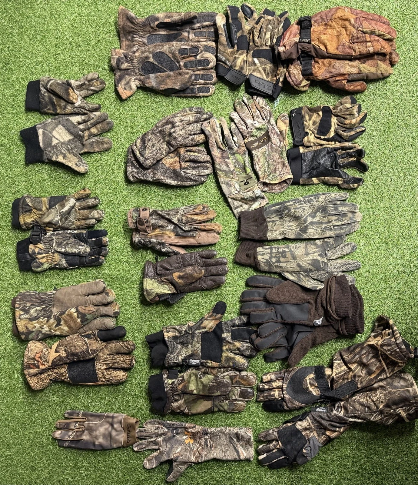 14 Pairs Of Hunting Gloves. Some Are Mixes Some Are Complete Pairs. A Few Extras
