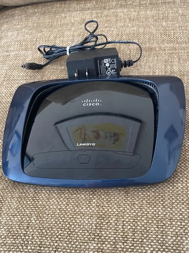 Cisco-Linksys WRT400N Simultaneous Dual-Band Wireless-N Router +Adaptor
