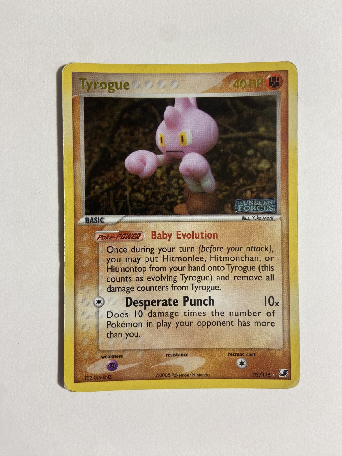 2005 POKEMON UNSEEN FORCES #33/115 TYROGUE REVERSE HOLO STAMPED
