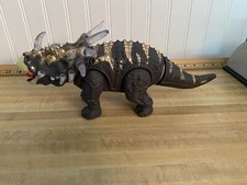 Preowned Electronic Walking Triceratops Jurassic Dinosaur Lights Sounds Tested