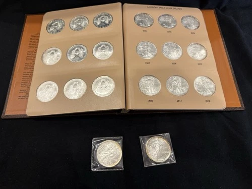 Dansco album with 35 American Eagle Silver Dollars 1986-2024.