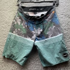 O NEILL BOARD SHORTS YOUTH SIZE 14 GREEN FLORAL