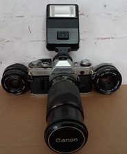 55mm CANON AE-1 35mm Film Camera Body UNTESTED extra lenses TOKINA battery flash