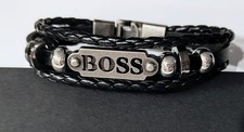 PULSERA HUGO BOSS Mod. 2 CUERO TRENZADO, METAL, CUENTAS RETRO. Cierre seguro.