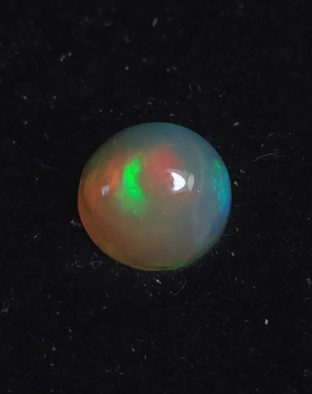 Opale Welo cabochon rond 1,41 cts d'Éthiopie, pierre brute taillée pour réparation de bijou
