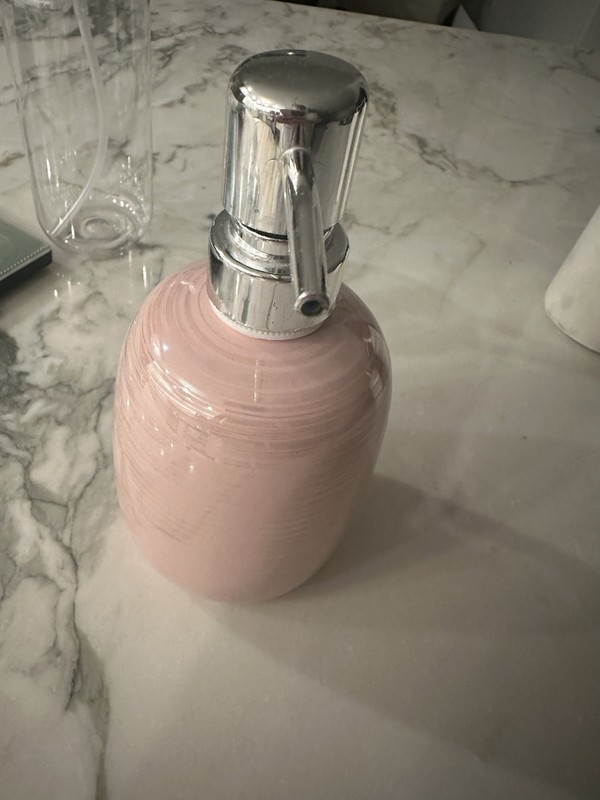 pink ceramic soap dispenser