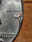 1980P Kennedy Half Dollar Obverse small Rim Cud circulated