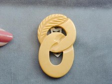Fancy Carved Butterscotch Bakelite Fur Dress Scarf Clip