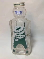 Galaxy Space Man " Space Bombardier" Green bottle & coin bank Rare