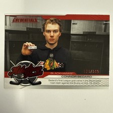 2024-25 Upper Deck Credentials - Milestone Pucks Connor Bedard #MP-CB Red /149