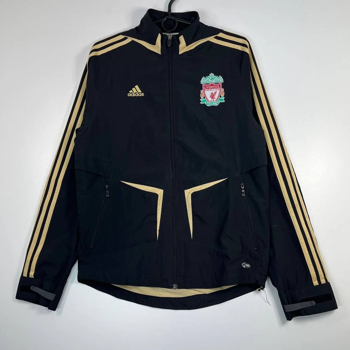 Preços baixos em Adidas Liverpool International Club jaquetas fãs