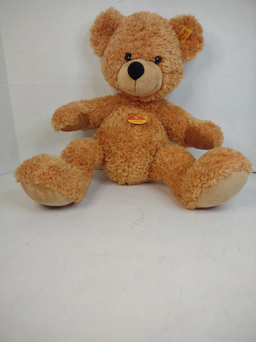 Bear with sales button in ear