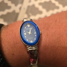 Studio Quartz Women's Oval Blue Dial Silver Tone Bangle Cuff Watch needs battery