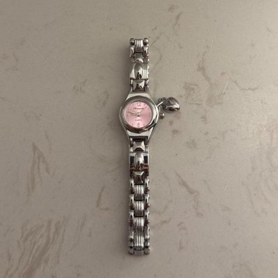 Silver-tone bracelet watch with soft pink face Attached heart charm detail