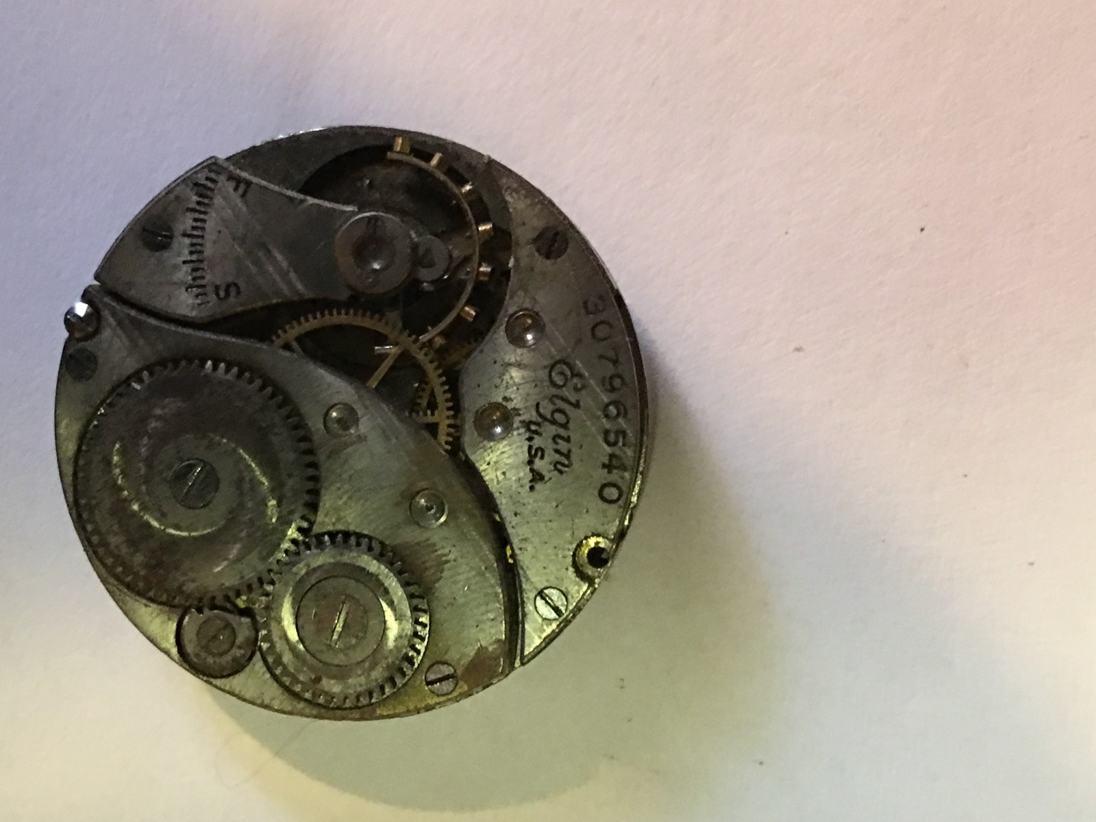 Antique Elgin watch movements for parts. One is a 7 Jewel lady's is 15