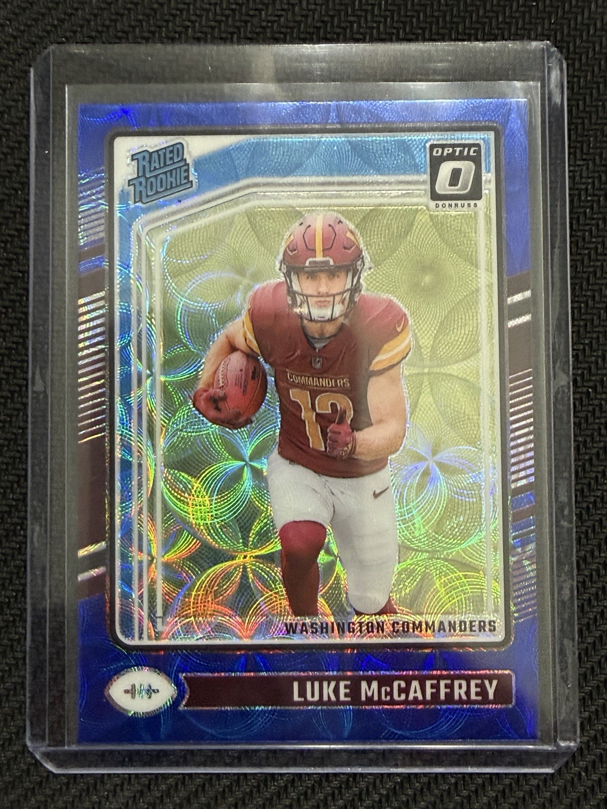 2024 Panini Donruss Optic - Rated Rookie Luke McCaffrey #268 Blue Glitter Prizm